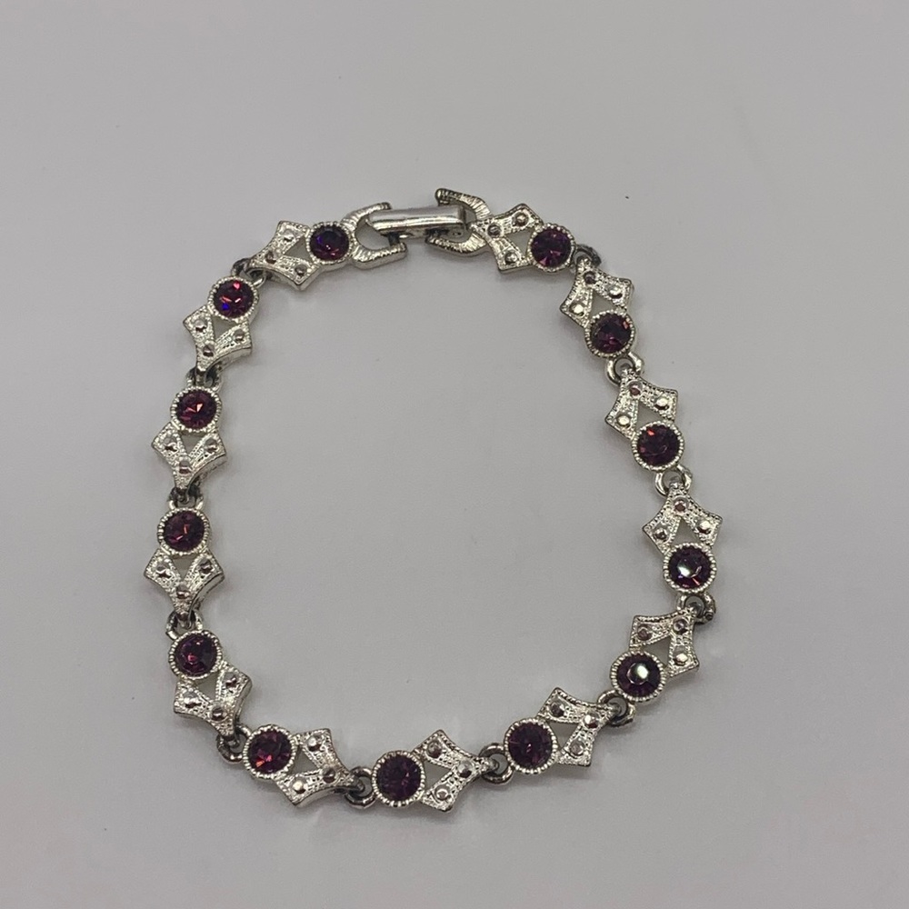 Silver Tone V Shaped Link Bracelet with Purple Rhinestones